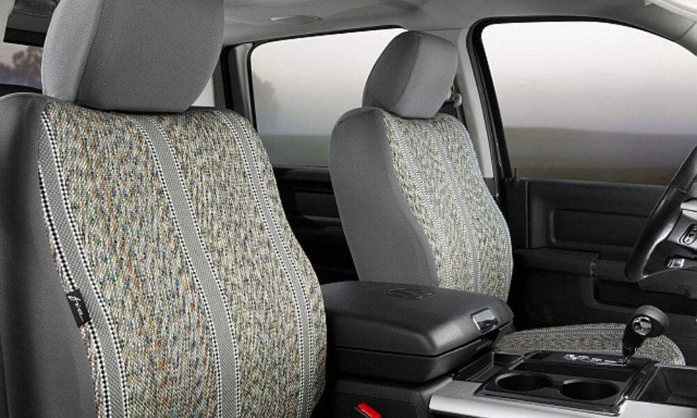 What’s the best way to upgrade your truck’s seats? Read about if you should reupholster your truck or buy seat covers to revitalize the interior!